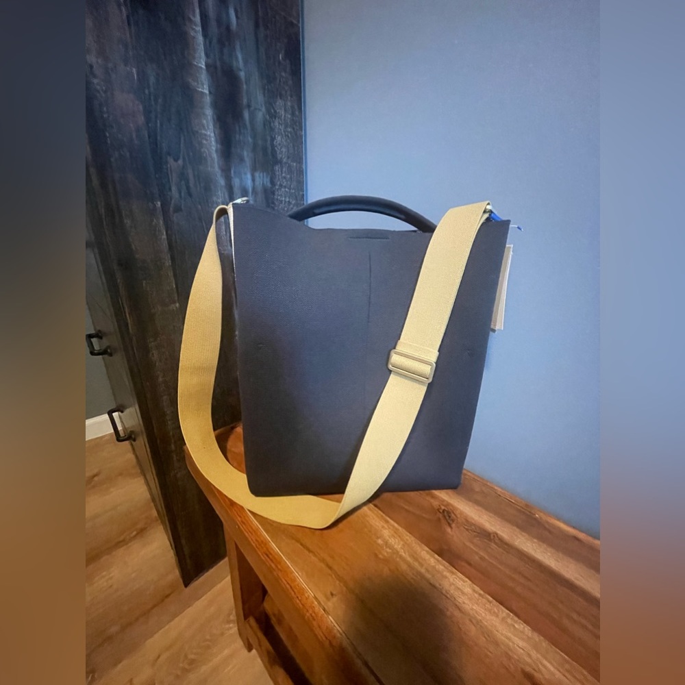 Rothy’s Ink and Ivory bucket bag